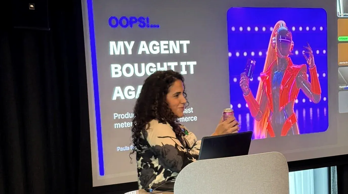 Paula Rivero opening her session beside the title slide, Oops! My Agent Bought It Again
